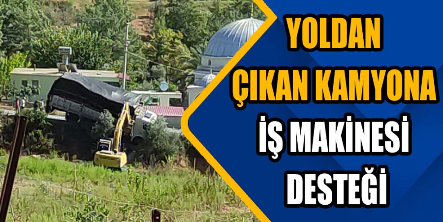 YOLDAN ÇIKAN KAMYONA İŞ MAKİNESİ DESTEĞİ