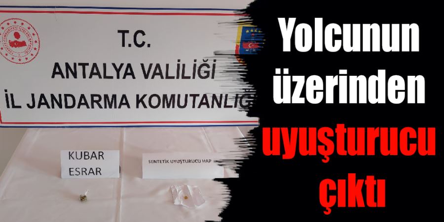 YOLCUNUN ÜZERİNDEN UYUŞTURUCU ÇIKTI