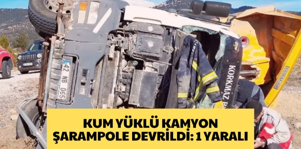 KUM YÜKLÜ KAMYON ŞARAMPOLE DEVRİLDİ: 1 YARALI