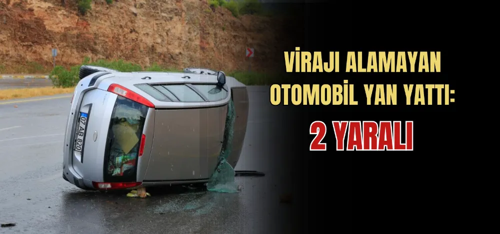 VİRAJI ALAMAYAN OTOMOBİL YAN YATTI: 2 YARALI